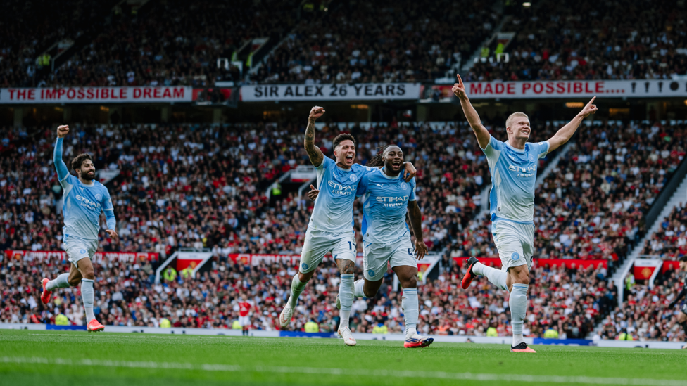 Erling Haaland and Manchester City teammates celebrating at Old Trafford, from the club’s 13 September 2026 derby gallery