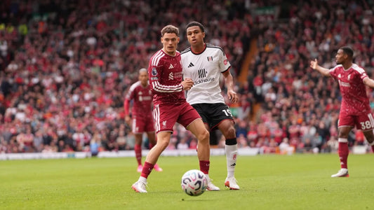 Liverpool and Fulham players contesting the ball at Anfield during their 0-0 draw on 12 September 2026