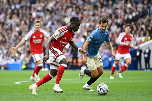 Bukayo Saka on the ball under pressure from Olivier Boscagli during Brighton v Arsenal on 19 September 2026
